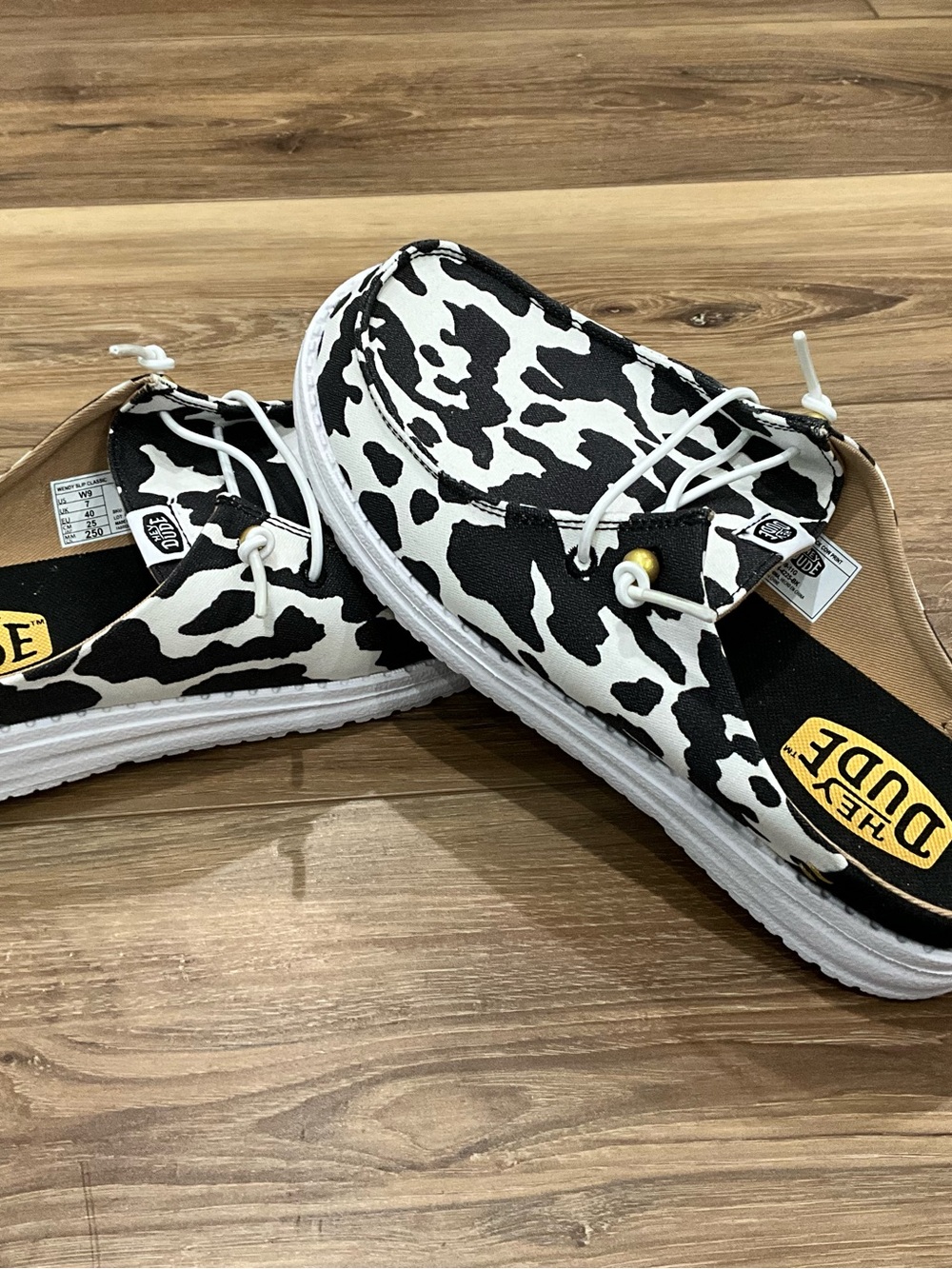Women’s Hey Dude Cow Print Slip-On Shoes Black & White *NEW* Sz 9